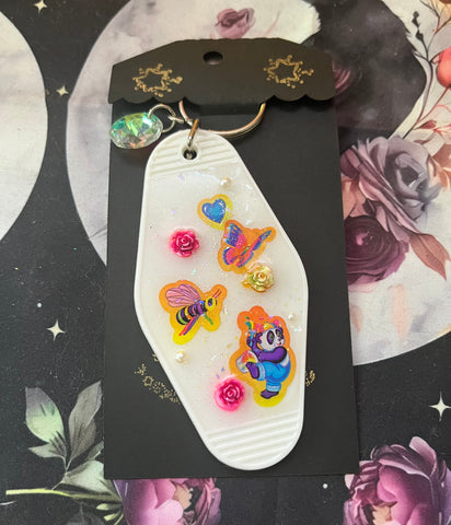 Rainbow Paint Motel Keychain