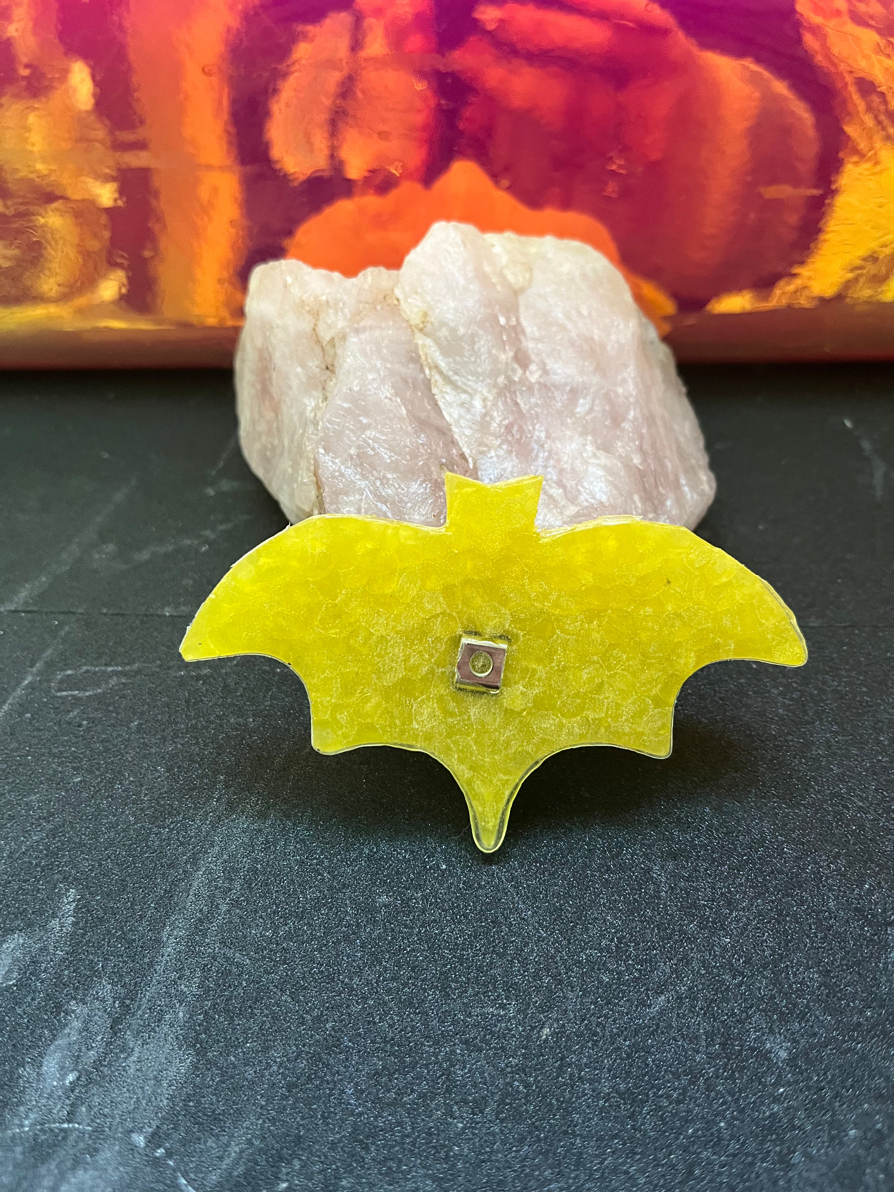 Lemon scented yellow bat shaped car freshener with vent clip