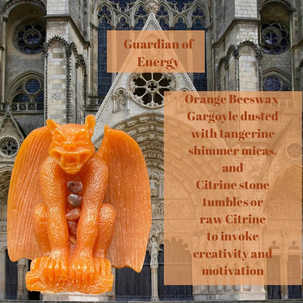 Description  of Orange Shimmering beeswax gargoyle that reads " Orange beeswax gargoyle dusted with tangerine shimmer micas and raw citrine to evoke creativity and motivation" 