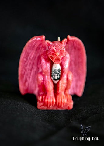 Pink Shimmering Beeswax Gargoyle with double terminated rhodonite crystal 