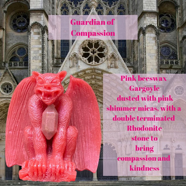 Guardian of compassion description text reads  Pink beeswax gargoyle dusted with pink shimmer micas and double terminated rhodonite crystal to bring compassion and kindness