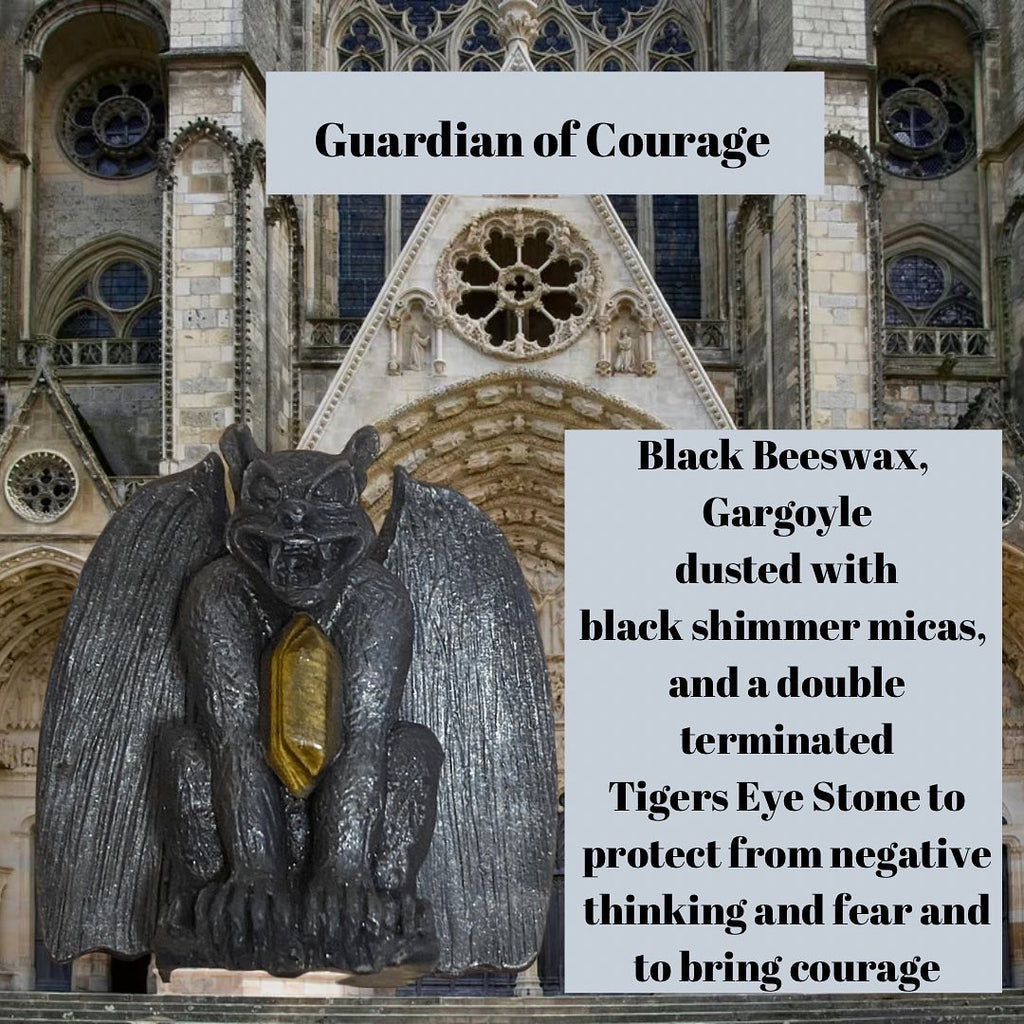 Guardian of courage description that reads "Black beeswax gargoyle dusted with black shimmer micas and double terminated tigers eye crystal  to protect from negative thinking, fear and to bring courage "